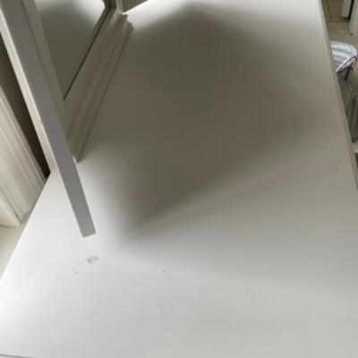 White vanity with mirror and stool