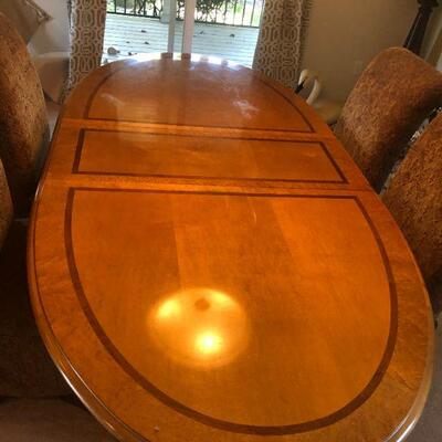 Beautiful Light Wood Inlay Oval Dining Table with 2 Extension Pieces and 4 Fabric Chairs