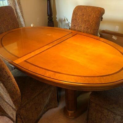 Beautiful Light Wood Inlay Oval Dining Table with 2 Extension Pieces and 4 Fabric Chairs