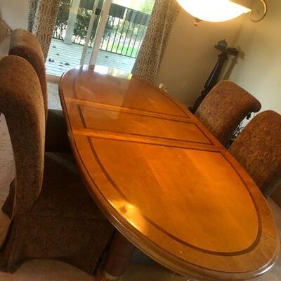 Beautiful Light Wood Inlay Oval Dining Table with 2 Extension Pieces and 4 Fabric Chairs