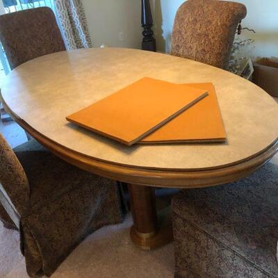 Beautiful Light Wood Inlay Oval Dining Table with 2 Extension Pieces and 4 Fabric Chairs