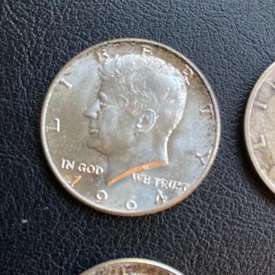 Collection of 4 Silver Half Dollar Coins with 1935 Walking Liberty and 1964 Kennedy Halves