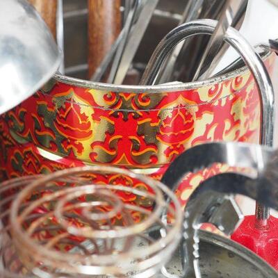 Lot 15 Enamel pot and cooking utensils