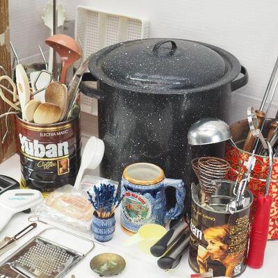 Lot 15 Enamel pot and cooking utensils