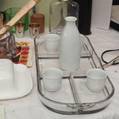 Lot 17- Flask holder portable shot glasses, trays, Sake set.