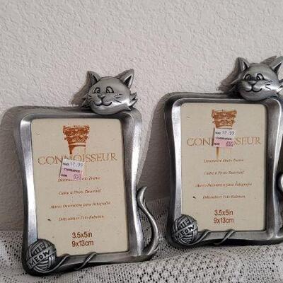 Lot 36: Assorted CAT Themed Frames, Book and Sign