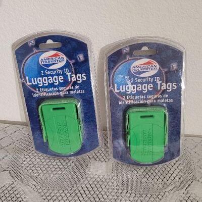 Lot 67: (2) New Travel Luggage Tags