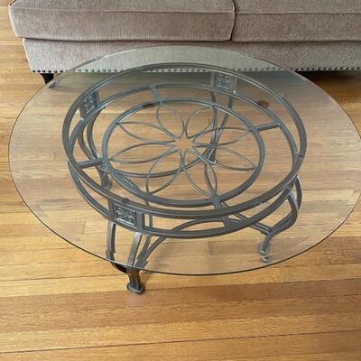 Glass round table with metal base