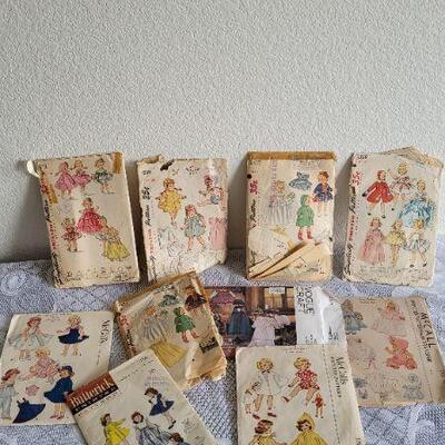 Lot 105: Assorted Vintage Doll Printed Sewing Patterns 