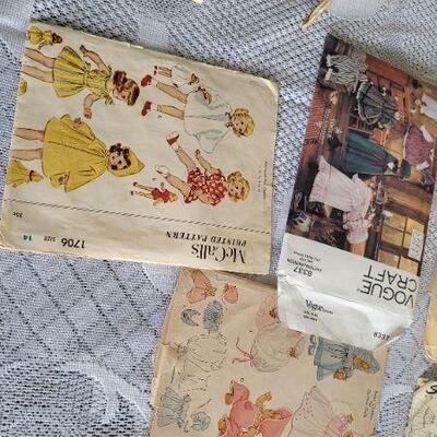 Lot 105: Assorted Vintage Doll Printed Sewing Patterns 