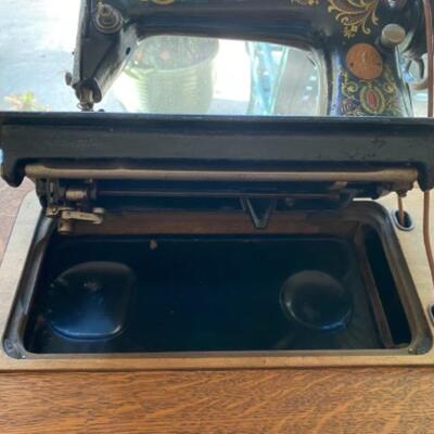 Antique Singer Sewing Machine with Fully Enclosed Treadle Cabinet