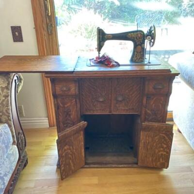 Antique Singer Sewing Machine with Fully Enclosed Treadle Cabinet