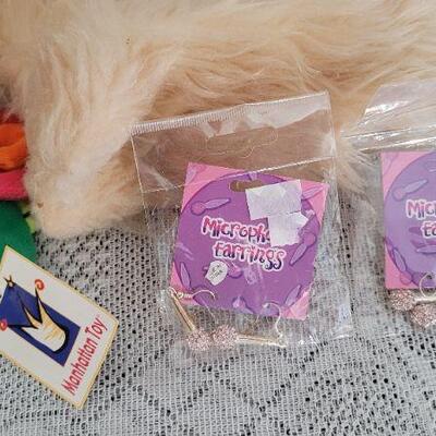 Lot 167: Assorted Puppets, Microphone Earrings and Luggage Tags