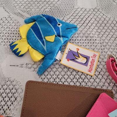 Lot 167: Assorted Puppets, Microphone Earrings and Luggage Tags