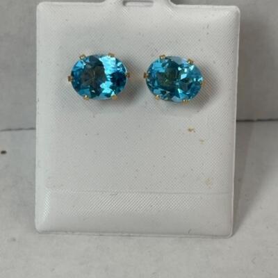 K567 14kt Yellow Gold Oval Blue Topaz Pierced Earrings 