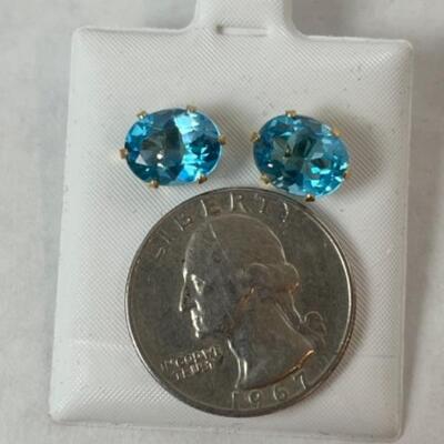 K567 14kt Yellow Gold Oval Blue Topaz Pierced Earrings 