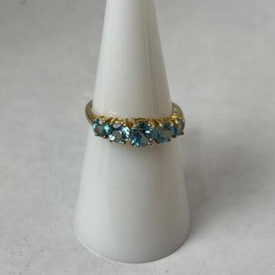 K580 10k Yellow Gold Blue Topaz Ladies Ring 