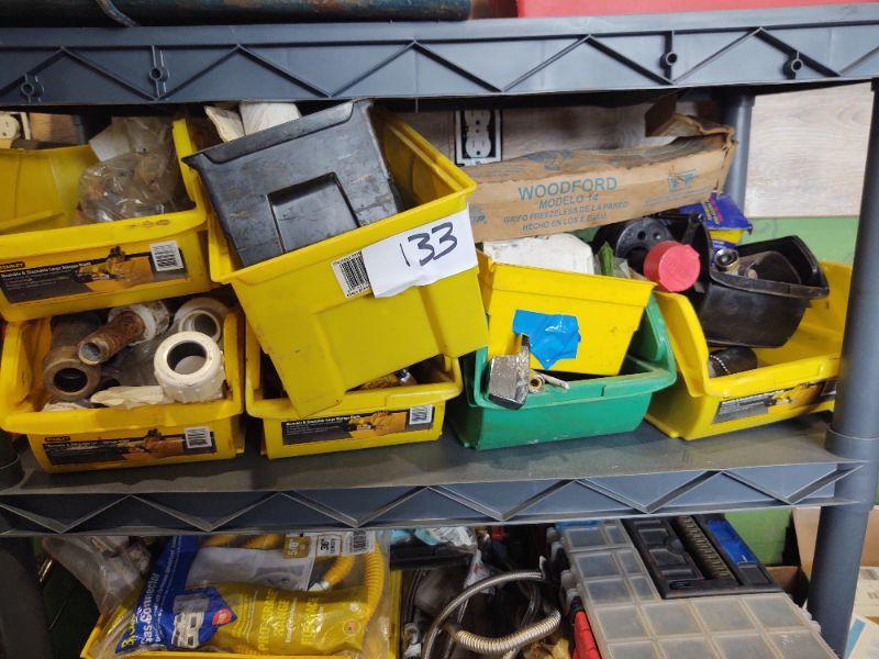 lot 133 - Several bins of assorted plumbing parts on this shelf only ...