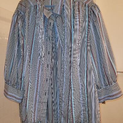 Lot 226: Ladies Blouses and Skirt Sets (size 16)