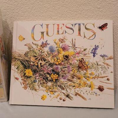 Lot 229: NEW Guest Book and New 750 pc. PUZZLE