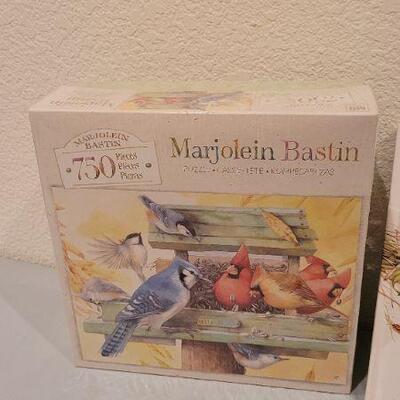 Lot 229: NEW Guest Book and New 750 pc. PUZZLE