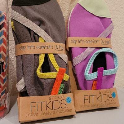 Lot 254: New Ice Chill Pack, Designer Socks and FIT KIDS Shoes 