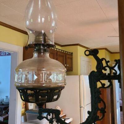 Lot 22F: Vintage Oil Lamps on Swing Arm Brackets