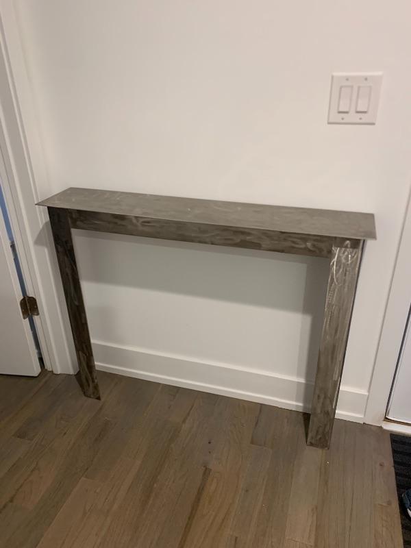 Contemporary hammered steel skinny side table