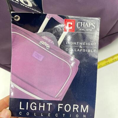 CHAPS LARGE â€œLIGHT FORMâ€ ROLLING PURPLE SUITCASE