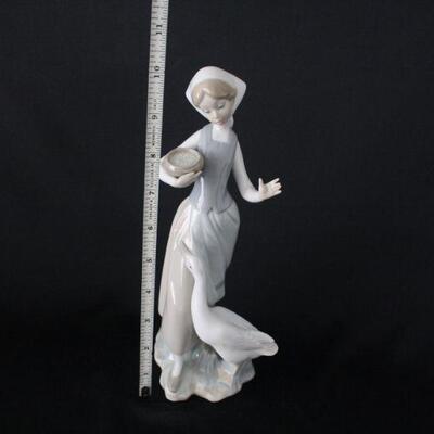 Lot #243: Lladro #3054 Girl Seated with Goose Porcelain Figurine