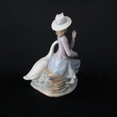 Lot #243: Lladro #3054 Girl Seated with Goose Porcelain Figurine