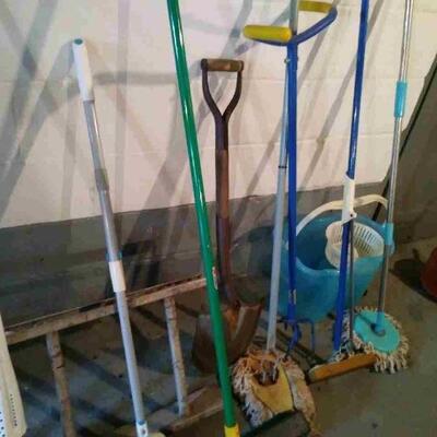 Lot 312: Coolers, Ladder, and Cleaning Supplies