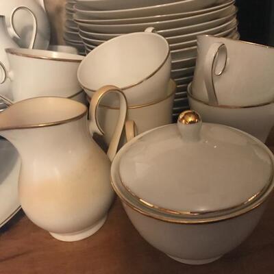 Lot 31K:  White with Gold Trim Tea Set and Dinner Ware. 