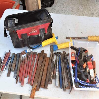 lot 164 Toolbag of assorted punches, chisels, crowbars, small bin of clamps, bungees