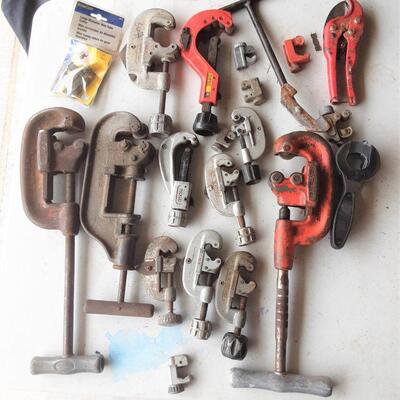lot 168 Assorted clamps, grips, etc in yellow basket