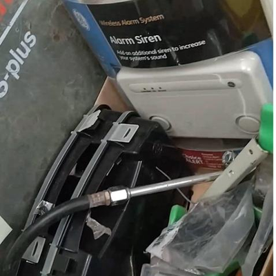 lot 184 - Box of assorted items - fan, alarm siren, kits, air guage, alert, fastener kit, clamps, etc