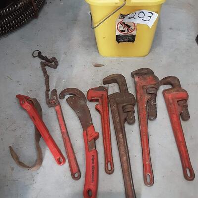 lot 203 - Bucket of pipe wrenches