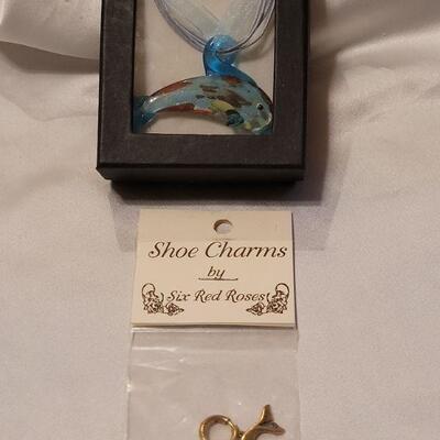 Lot 89: New Glass Dolphin Necklace and Dolphin Charm