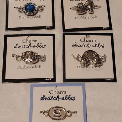 Lot 91: New (5) Charm Switchables 