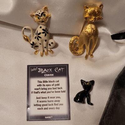 Lot 97: Cat Brooches and Pocket Charm (1 Gold Tone,  1 Enameled)