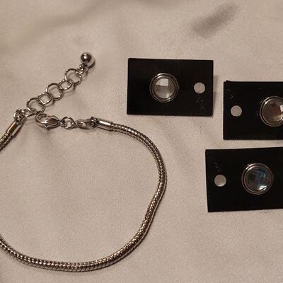 Lot 98: New Silver Bracelet and 3 Slider Charms