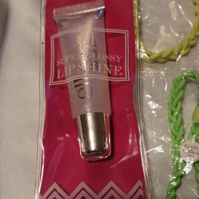 Lot 99: New Lip Glosses, Ponytail Holders and Mini Make Up Brushes 
