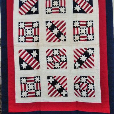 LOT 28  HAND STITCHED ALL AMERICAN RED, WHITE, AND BLUE QUILT 