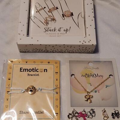 Lot 120: New Stackable Gold Rings, Emoticon Bracelet and Interchangeable Pendant Necklace