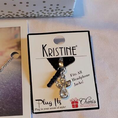 Lot 131: New Gold Stackable Rings, Interchangeable Pendant Necklace and Cell Phone Charm