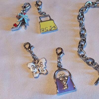 Lot 141: New Charm Bracelet with Charms