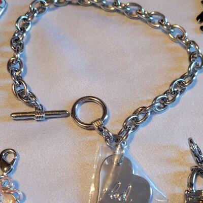 Lot 143: New Charm Bracelet with Charms