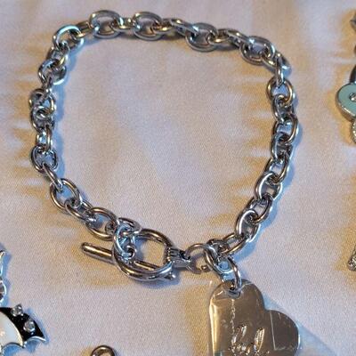 Lot 145: New Charm Bracelet with Charms 