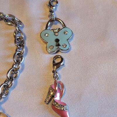 Lot 145: New Charm Bracelet with Charms 