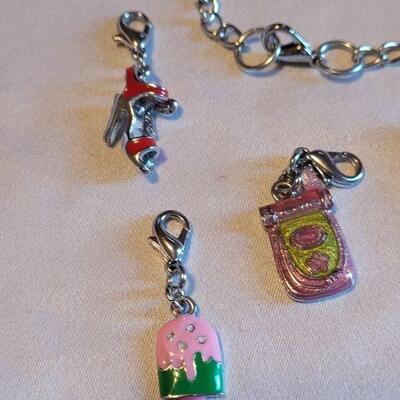 Lot 147: New Charm Bracelet with Charms 